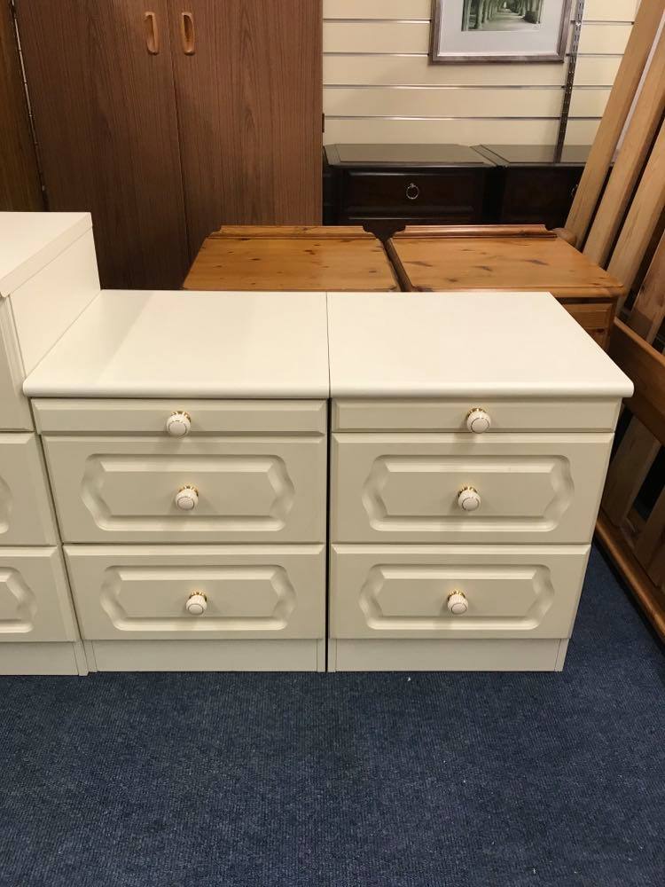 Pair of large white bedside cabinets in very good condition. Matching chest of drawers also available.